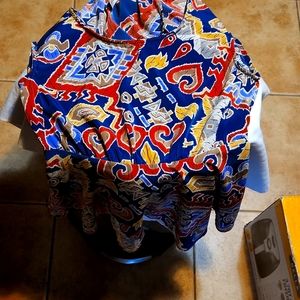 It's a Cute top Sz  ( SM )100 % Polyester easy wear No Ironing - Hang to Dry